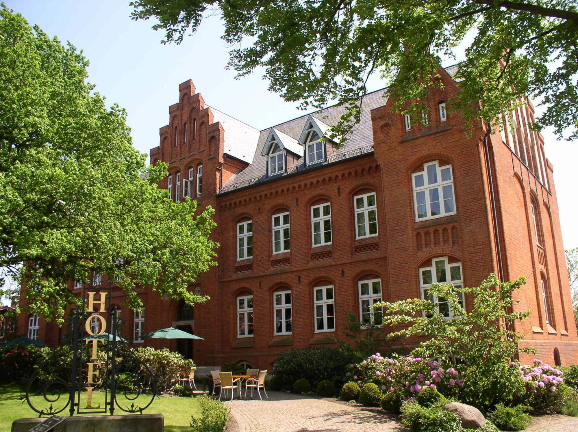 Hotel Altes Gymnasium ฮูซุม ภายนอก รูปภาพ